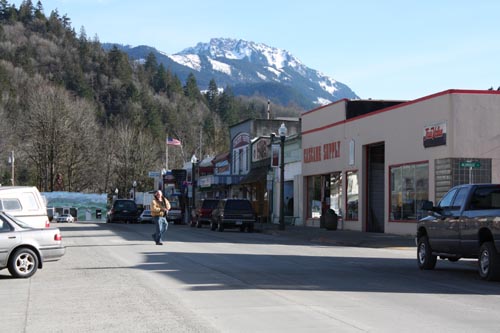 With Sauk Mountain as a backdrop, Concrete’s Main Street town center bustles during the summer tourist season. With State Route 20 closing at Ross Lake each winter, and the recent closure of the overnight camping area at Rockport State Park 10 miles to the east, however, the off-season months make economic viability a daunting challenge for area businesses. “I see the Concrete Herald as something every eastern Skagit County business can rally around, and not just in terms of advertising dollars,” said Jason Miller, the Concrete writer and editor who has launched a fundraising drive to bring back the town’s newspaper.