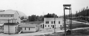 This circa 1926 photo shows the east facade of the Superior Portland Cement Company Office and Laboratory Building and the original timeclock room. Constructed in 1923, the administrative building got a basement addition in 1928. In 1932 the safety monument was erected in front, facing Main Street. (Photo courtesy of Cal Portland.)